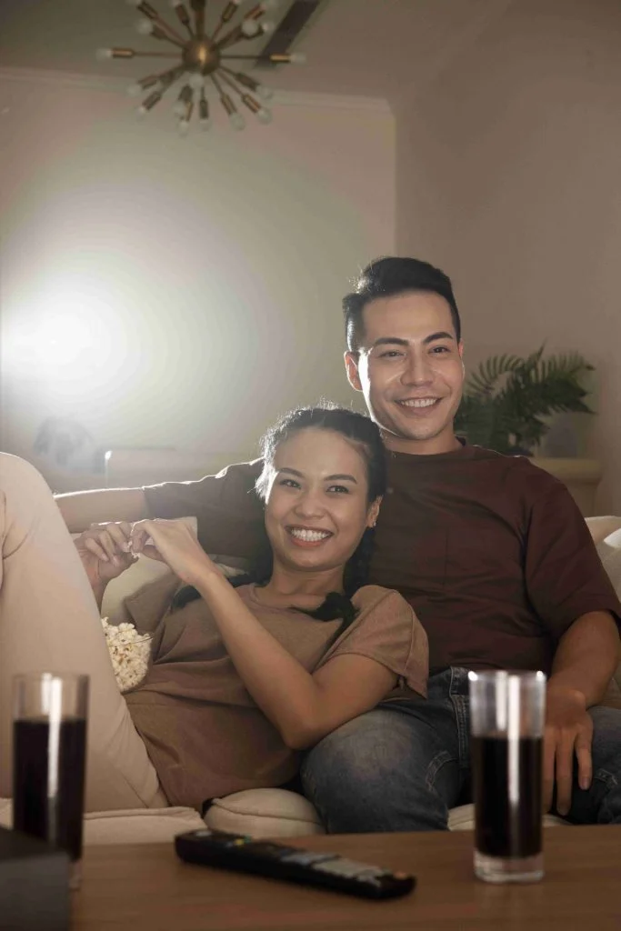 medium-shot-smiley-people-watching-movie-1-683x1024